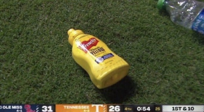 A French’s mustard bottle on the grass at Neyland Stadium during the Tennessee vs. Ole Miss game, October 16, 2021